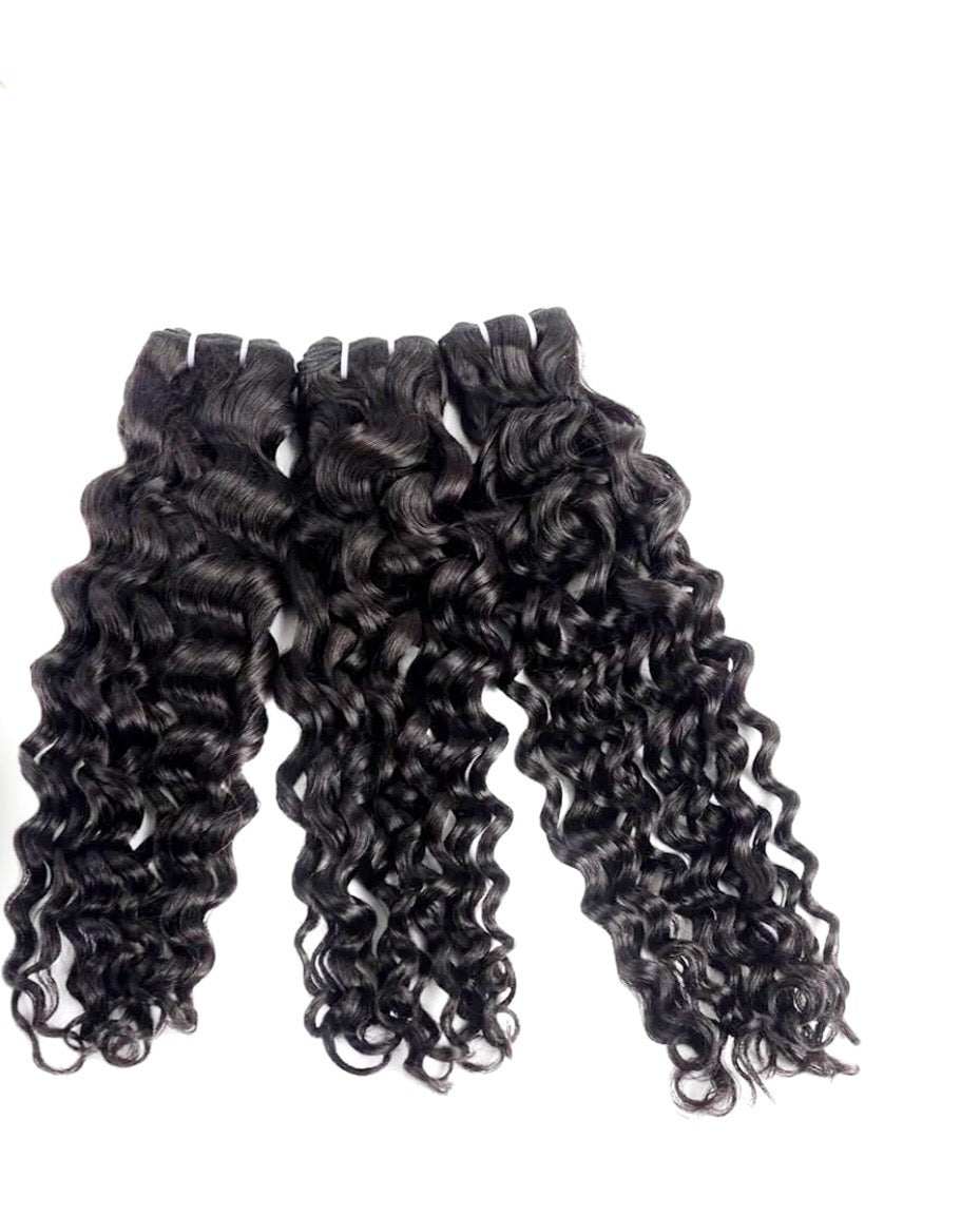 Ocean wavy hair bundle showing wet and wavy texture of premium human hair extensions.