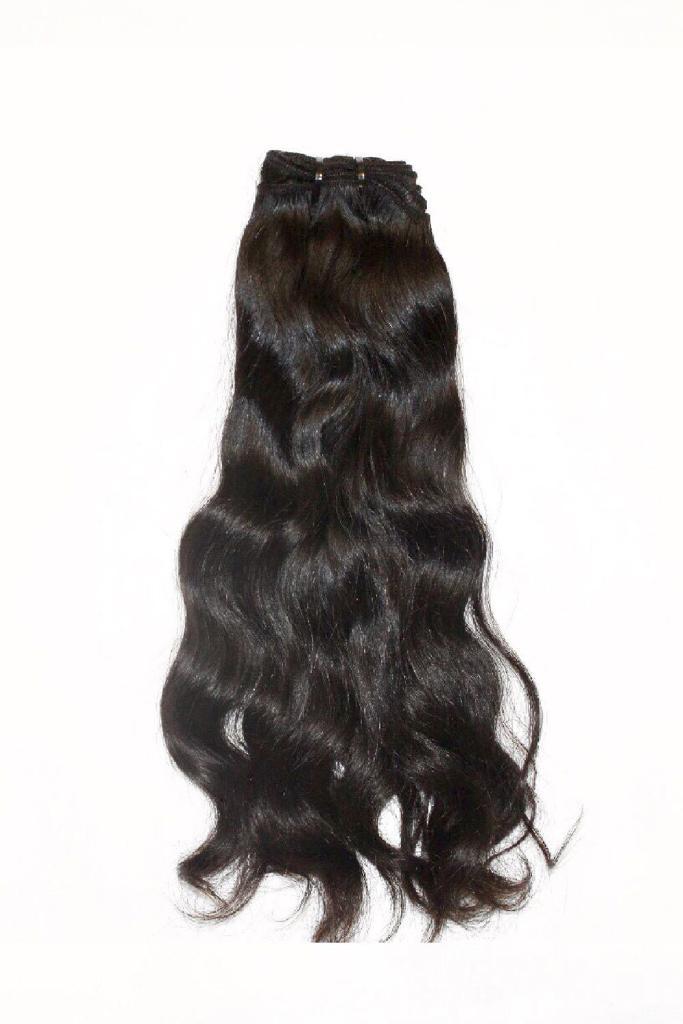 Close-up of Cambodian Wavy style pattern hair extensions in lengths 16"-30" showcasing natural waves and glossy texture
