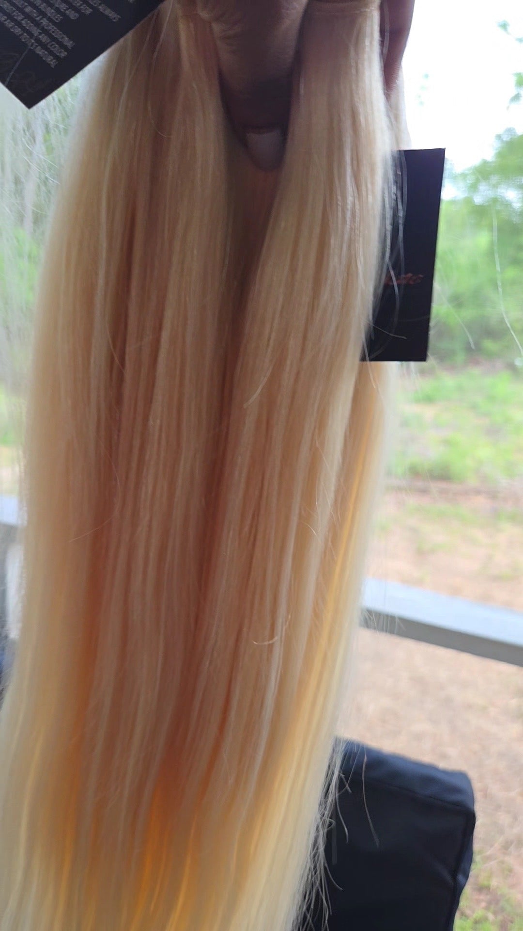 613 Blonde straight human hair bundles showcasing long, silky strands in radiant light blonde color