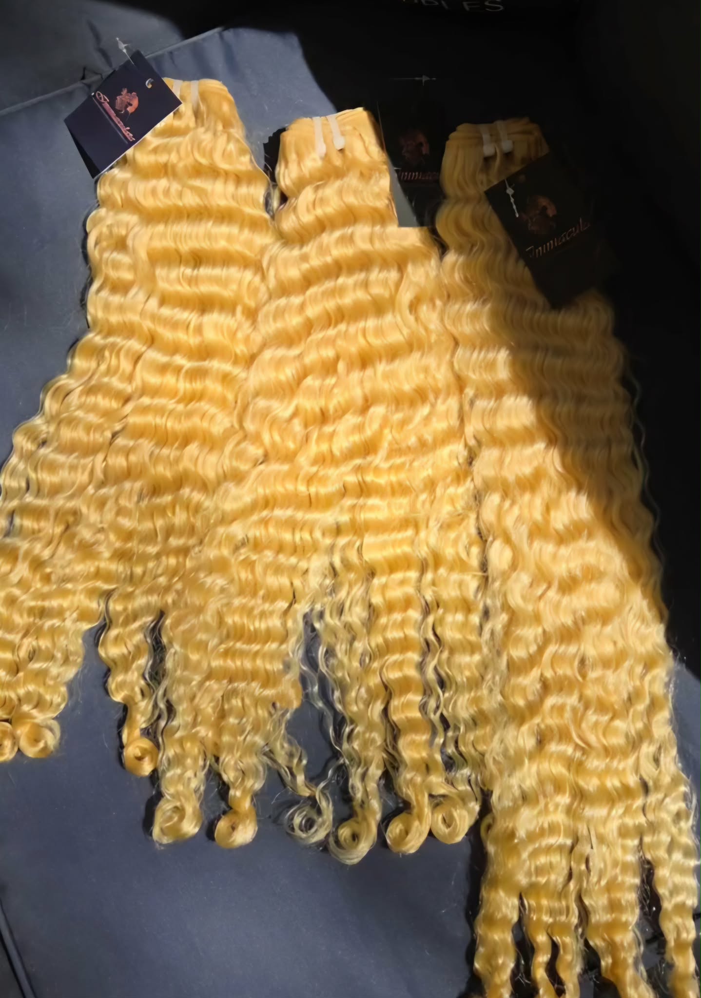 613 Blonde Burmese Curly Bundles Closure made of 100% human hair with natural curls and rich density