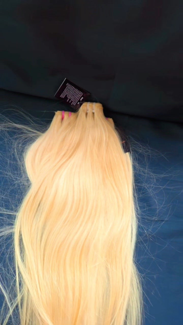 613 blonde straight hair bundles in varying lengths showcasing smooth, premium quality human hair extensions