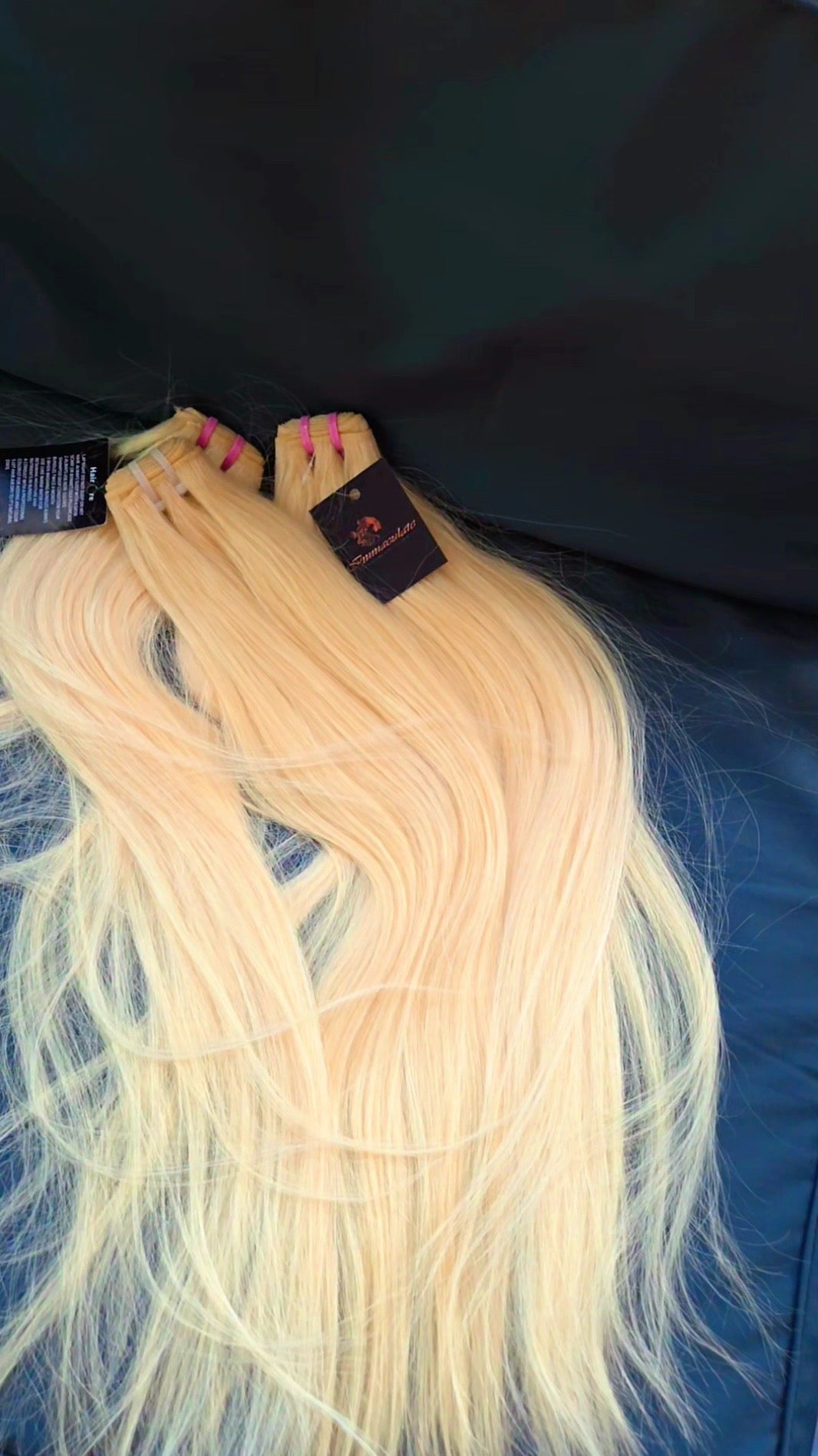 613 blonde straight human hair bundles display varying lengths from 14 to 30 inches, showcasing soft, natural texture and radiant light blonde color.