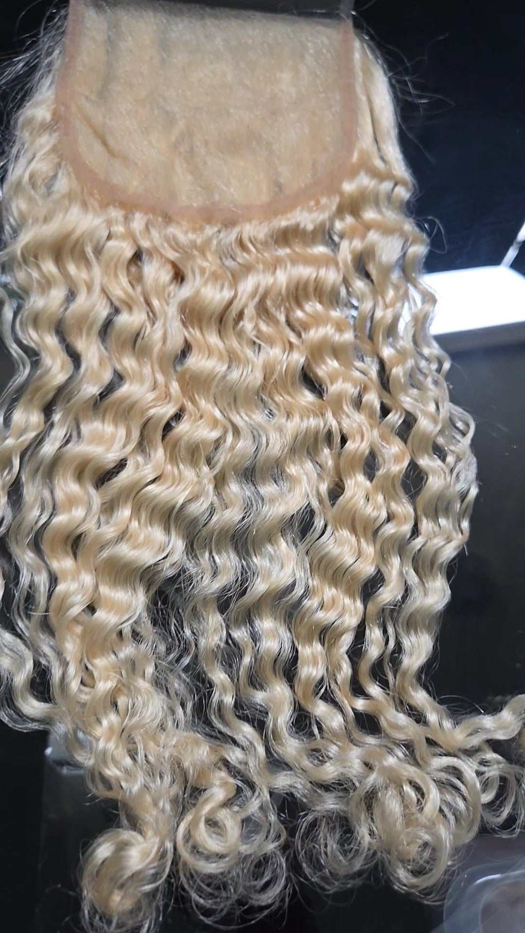 613 Blonde Burmese Curly 5x5 Closure with natural lace base and defined blonde curls