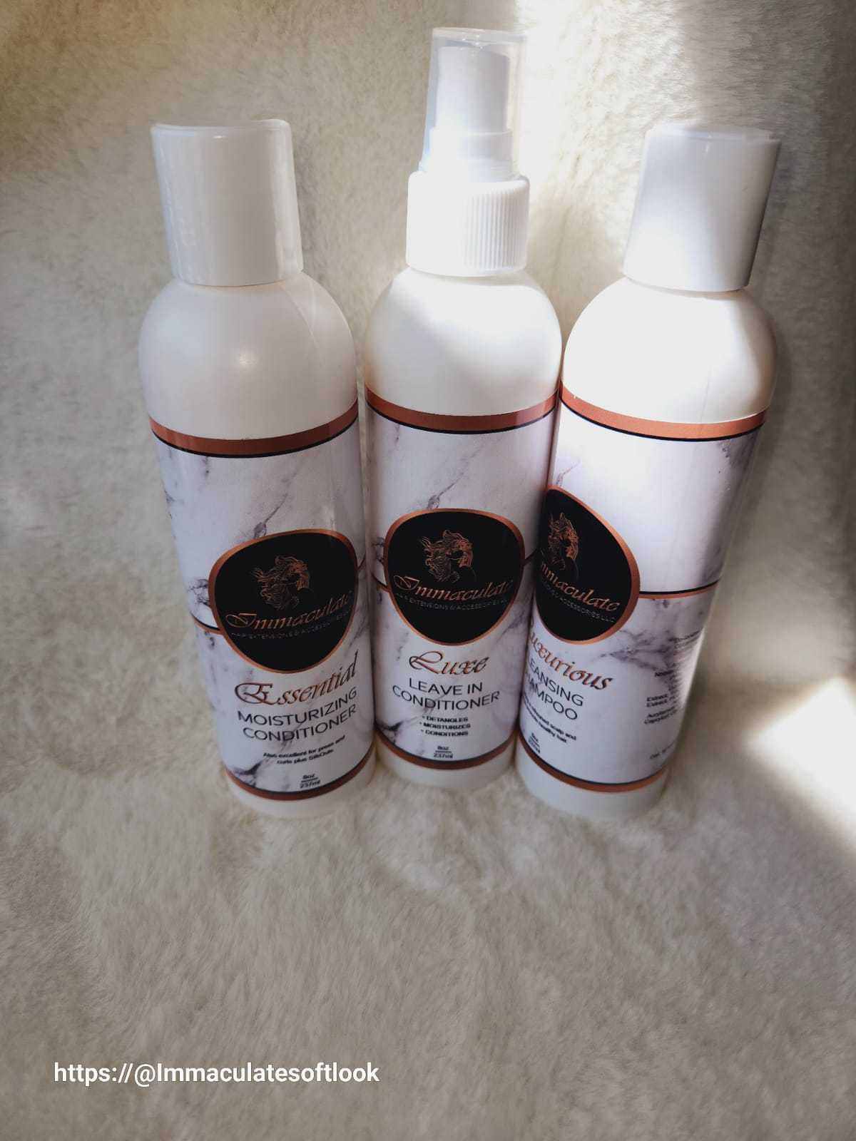 PURE ELEGANCE Hair Care Set featuring shampoo, leave-in, and moisturizing conditioner on soft background.